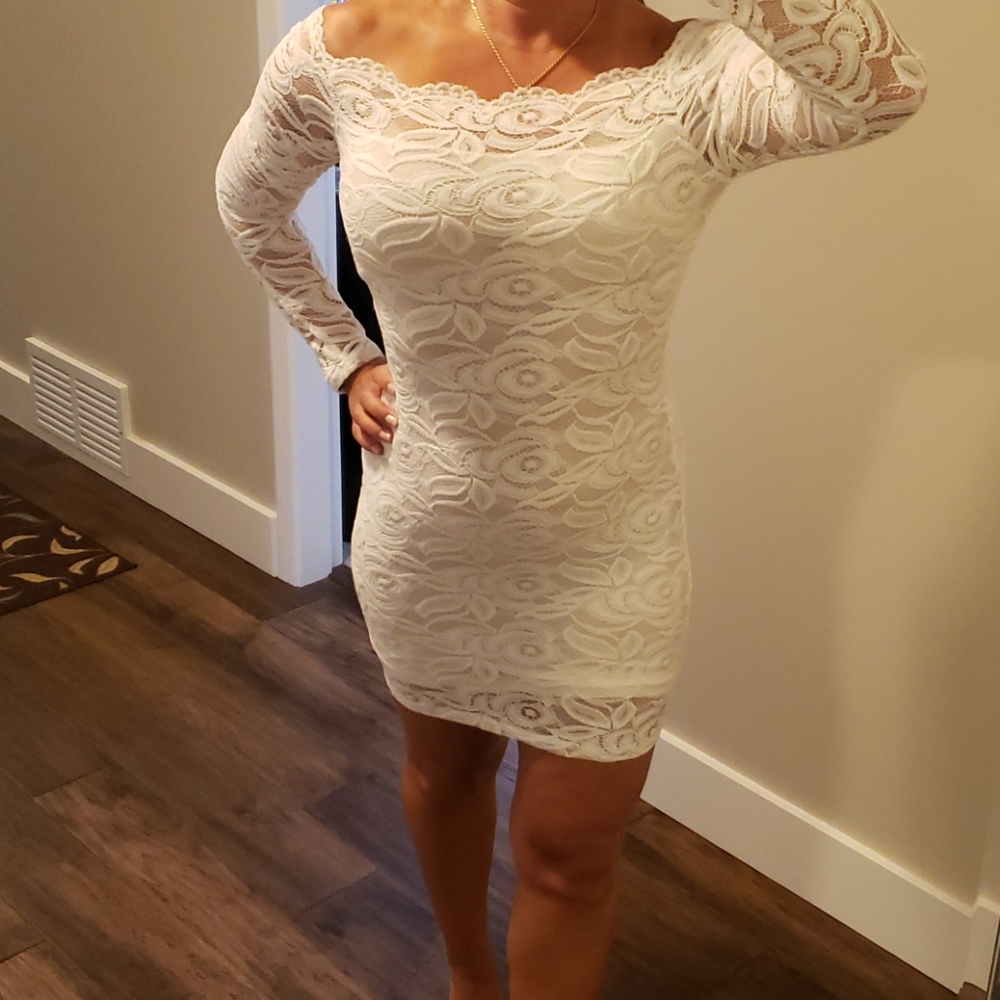 White lace form fitting stretch dress